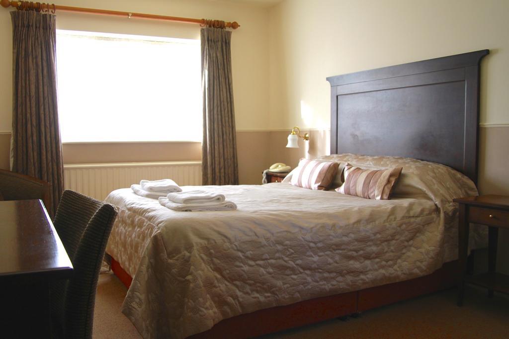 The Bell Hotel Clare Rum bild